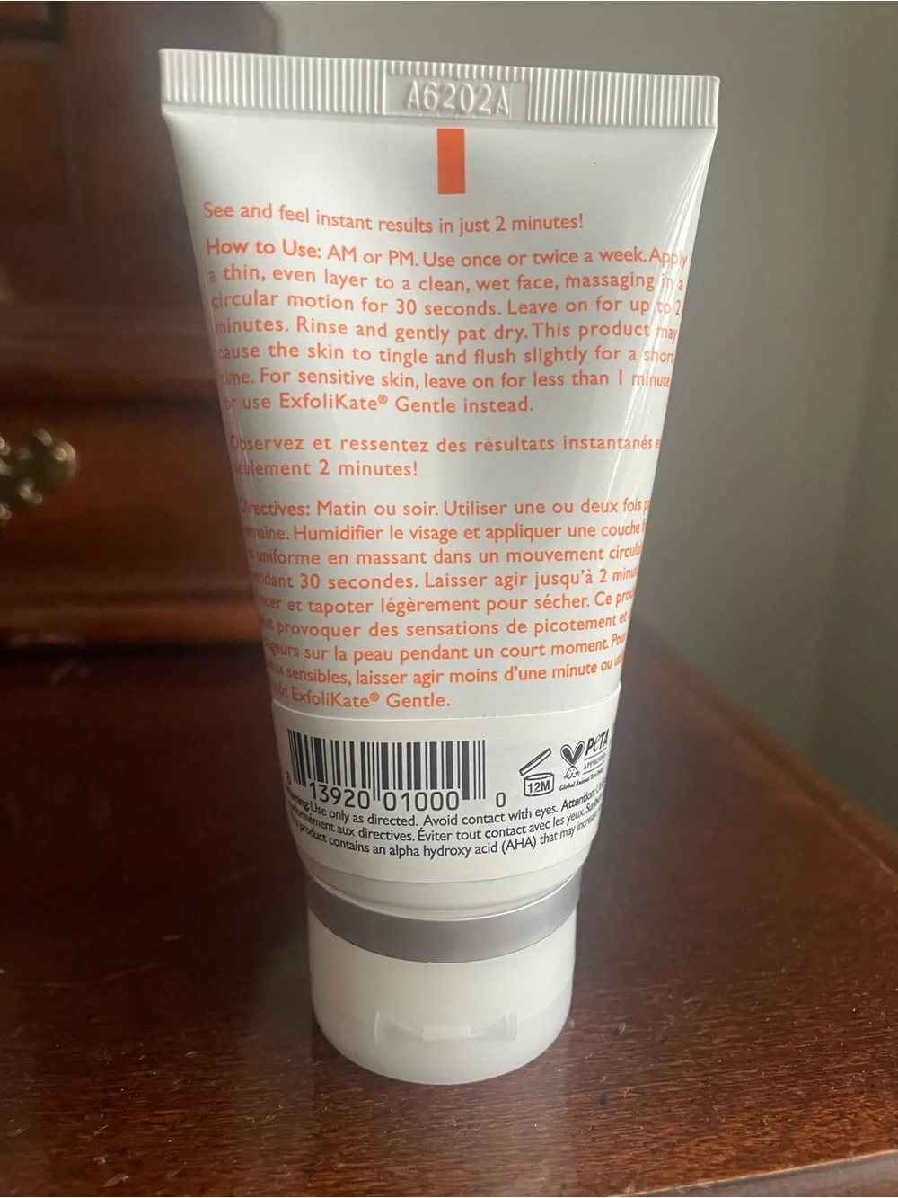 HUE White Tube Facial Cleanser & Exfoliant with Orange Text